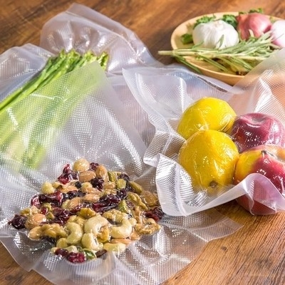 Le scelleur fait sur commande de vide de cuisine met en sac le plastique de stockage de nourriture de GV